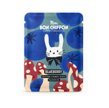 A blue resealable pouch of Mon Bon Chiffon Confectionery Co. Blueberry Cotton Candy Puff, featuring a white bunny with a black bow tie, red-and-white mushrooms, and blueberry motifs on a white background.