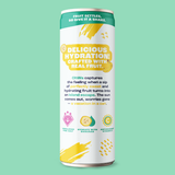 A tall white beverage can with green, yellow, and pink printed graphics, standing upright on a solid mint-green background. The can features the text 'DELICIOUS HYDRATION! CRAFTED WITH REAL FRUIT.