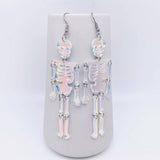 Mio Queena - Light Reflecting Skeleton Skull Dangle Earrings