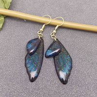 Mio Queena - Shimmery Butterfly Wing Dangle Earrings: Blue