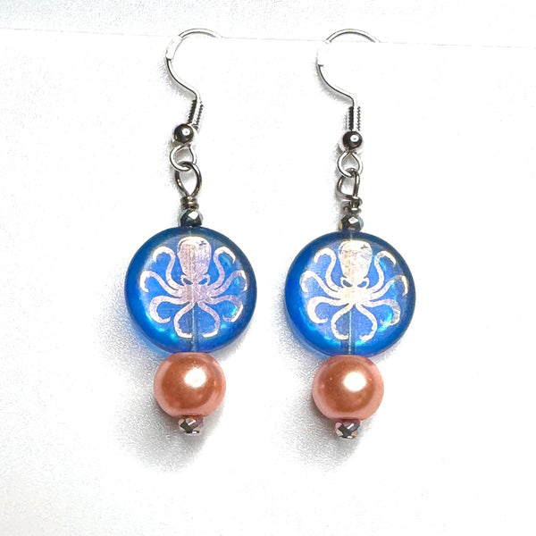 Amy Foxy Style Handmade Earrings - Blue Iridescent Octopus Silhouette and Peach Pearl Beads
